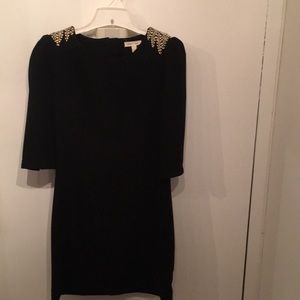 Time to part ways with this beautiful dress.